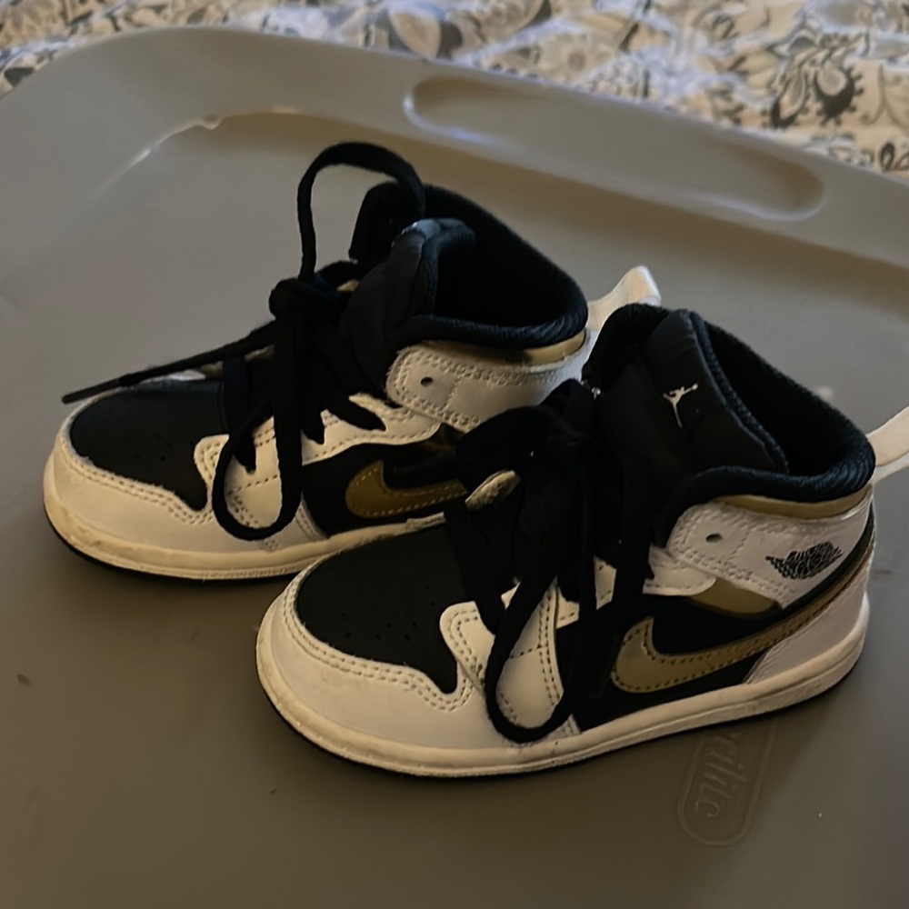 Nike Jordan’s Kids Black and Gold Sneakers